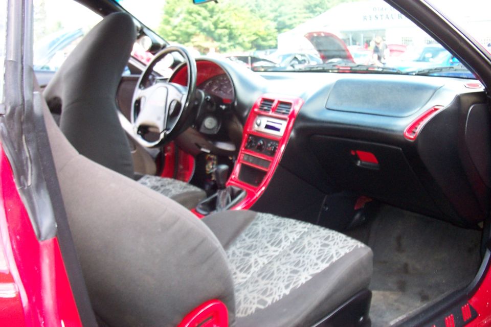 1993 Ford Probe interior with red trim accents and patterned seats