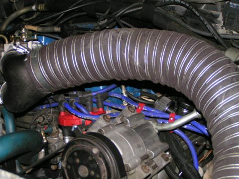 1990 Ford Bronco - intake tube I placed the Mass-Air and filter to the side of the Radiator for the Trip back down, if you look at my other pics you can see w…