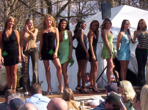1986 Ford Bronco - A group of women stand on a stage, possibly for a contest or event.