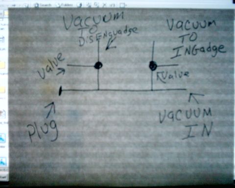 1978 Ford Bronco - A hand-drawn diagram illustrates a vacuum system with two valves and input/output lines.