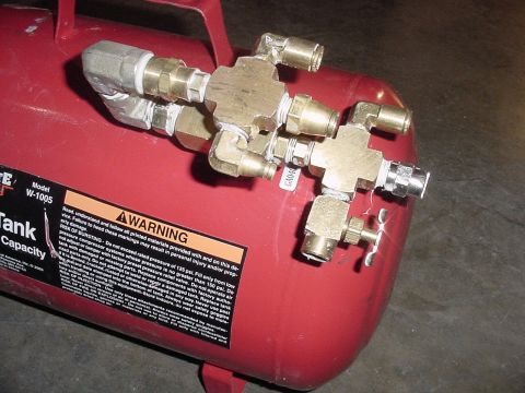 2002 Ford Excursion - Close up of tank fittings