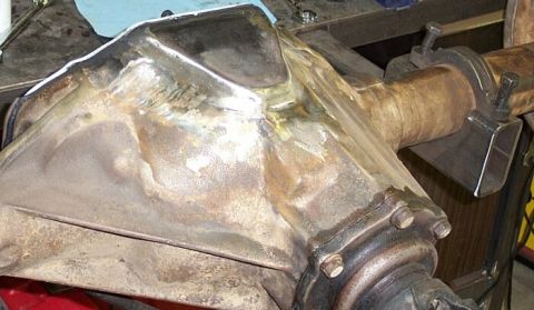 1986 Ford Ranger - Differential housing with visible welds and bolted components, likely undergoing repair or modification.