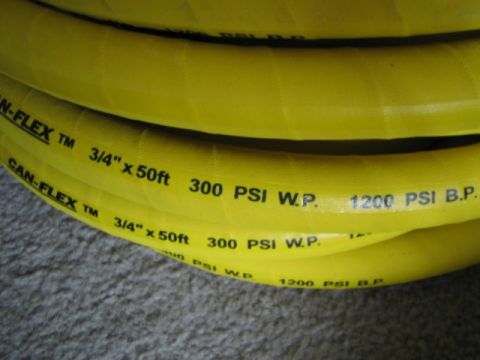 1996 Ford Bronco - This image shows a yellow hose with specifications including CAN-FLEX branding, dimensions, and pressure ratings.
