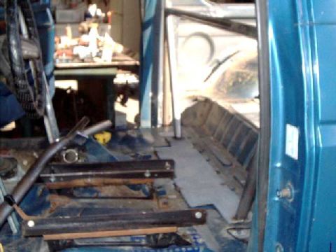1984 Ford Bronco - Frame supports tacked to steel plate, welded to the floor.