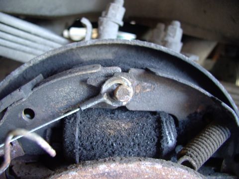 1986 Ford Bronco - Here it is exposed. Don't fight it up here trying to remove it. Reach down low to where it hooks on and unload the spring tension and you'l…