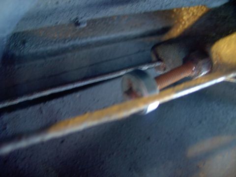 1986 Ford Bronco - I know, poor photo, but that's the threaded E cable adjuster having a die run up it to chase it's threads.