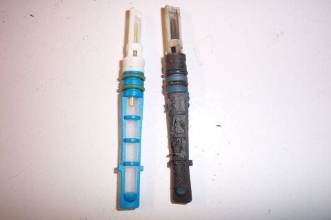 1992 Ford Bronco - New orifice tube on the left, one that was installed when the compressor died on the right