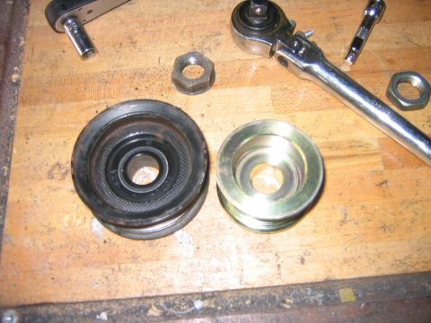 1995 Ford Bronco - Close up of the pulleys. All you have to do to get it off is put the pulley in a vice and go to town with an impact wrench; the old alt. wa…