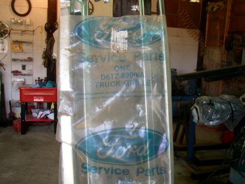 1995 Ford Bronco - A Ford truck grille is shown still in its original service parts packaging.