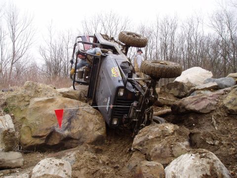 1992 Ford Bronco - This 1992 Ford Bronco is overturned while navigating a difficult rocky terrain.