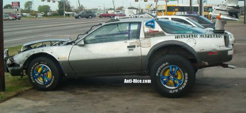1978 Ford Mustang II - This heavily modified car features off-road tires and a unique airplane tail spoiler.