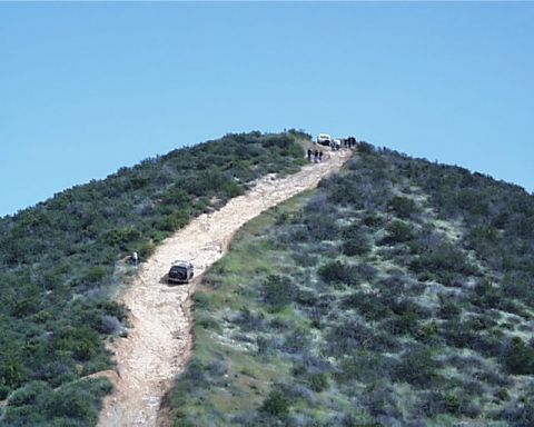 1993 Ford Bronco - Almost rolled it on this hill, Got past the "hard" part the "easy" part kicked my butt.