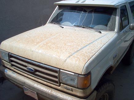 1988 Ford Bronco - This 1988 Ford Bronco shows its age with a dusty exterior and a cracked windshield.