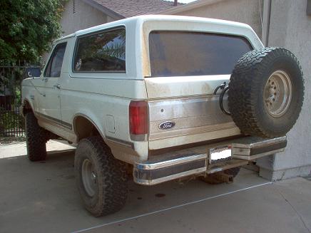 1988 Ford Bronco - This white Ford Bronco, seen from the rear, appears to be from the late 1980s, not specifically 1988.