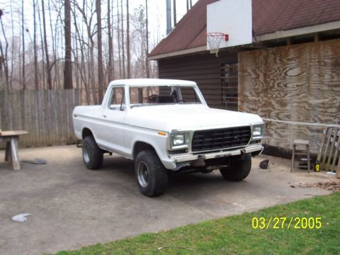 1979 Ford Bronco - White 1979 Ford Bronco with aftermarket wheels and tires.