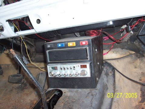 1979 Ford Bronco - Aftermarket CB radio and stereo unit installed in the dashboard of an older vehicle.