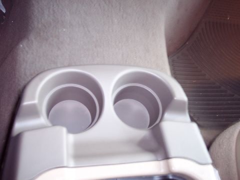 2000 Ford Excursion - Installed :) No more spill drinks! Although it feels different becasue i can feel my fingers extending to reach the coins or grabing my cel…