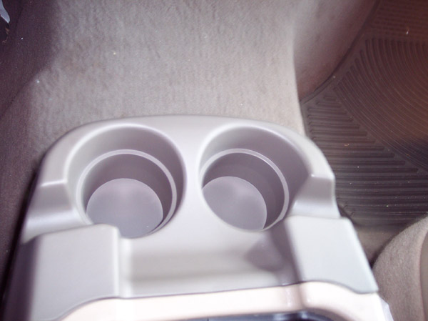 Installed :) No more spill drinks! Although it feels different becasue i can feel my fingers extending to reach the coins or grabing my cellphone. Oh well huh.