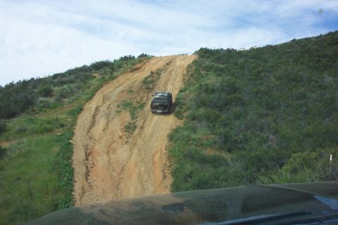 1996 Ford Bronco - 90Beater hitting the 1st hill.
