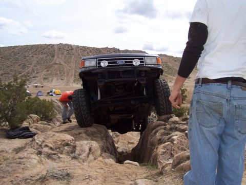 1989 Ford Bronco - Ford Bronco tackling rough terrain during an off-road adventure.
