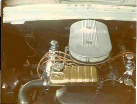 1963 Ford Galaxie - Close-up of an engine bay, an air cleaner and various engine components. Supermotors.net logo is present.