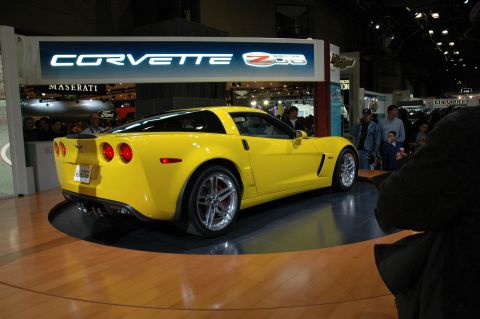 2005 Ford Mustang - Yellow Corvette Z06 displayed with its model name prominently visible.