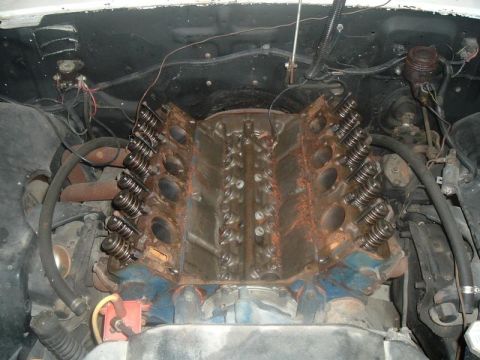 1963 Ford Galaxie - Engine bay of a 1963 Ford Galaxie, showing the V8 engine in a state of restoration.