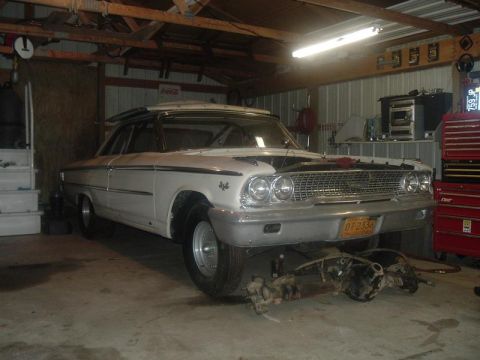 1963 Ford Galaxie - 1963 Ford Galaxie in garage, undergoing restoration with front end disassembled.