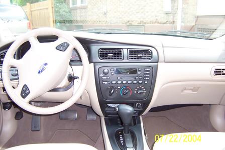 2000 Ford Taurus - Interior view of a 2000 Ford Taurus, showing the dashboard, steering wheel, and gear shifter.