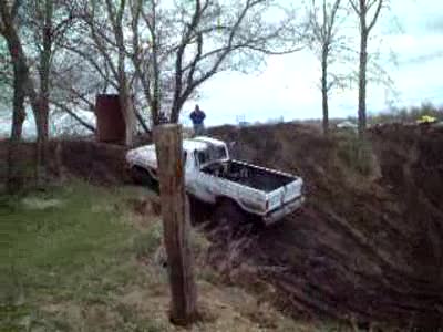 1979 Ford F-150 - Making it up the hill at Mud and More.