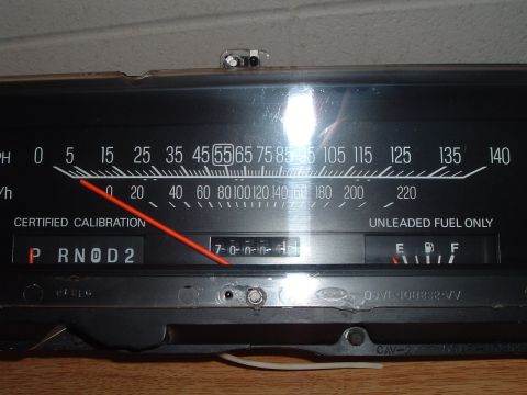 1989 Ford Crown Victoria LTD - Close-up of a vehicle's instrument cluster, showing the speedometer, odometer, and fuel gauge.