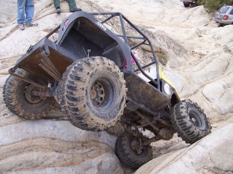 1989 Ford Bronco - A heavily modified off-road buggy navigates a challenging rocky trail during Spring Break 2005.