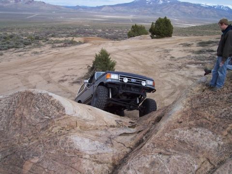1989 Ford Bronco - This lifted 1987 Ford Bronco navigates a rocky incline during an off-road excursion.