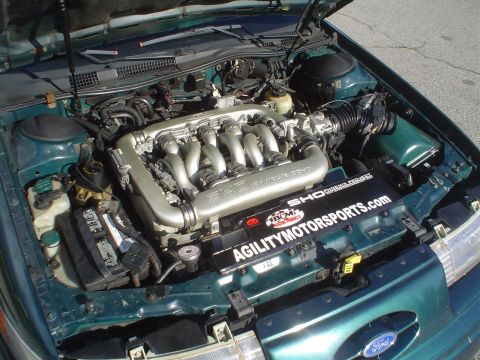 1993 Ford Taurus - my radiator cover.. with my sponsor, Agility Motorsports