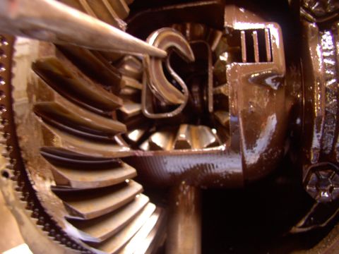 1986 Ford Bronco - After pulling out the pin lock and sliding the pin out of the way, I just pushed the axle shaft in a bit and that gives you access to the C…