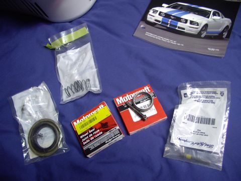 1986 Ford Bronco - Pinion seal on the left (in bag), two outer axle seals in boxes, crush sleeve and pin lock bolt (old) and new one, with loctite in threads,…