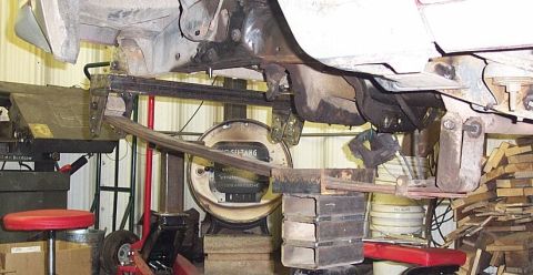 1986 Ford Ranger - The rear leaf spring suspension system is visible, with a scale in the background.