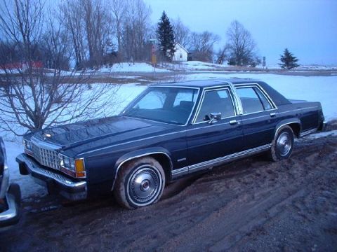 1984 Ford Crown Victoria LTD - Sitting in my muddy driveway after running through the carwash for the first time.