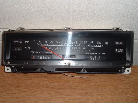 1989 Ford Crown Victoria LTD - This instrument cluster features a speedometer, fuel gauge, and gear indicator, likely from a vehicle of the late 1980s or early 1990s.