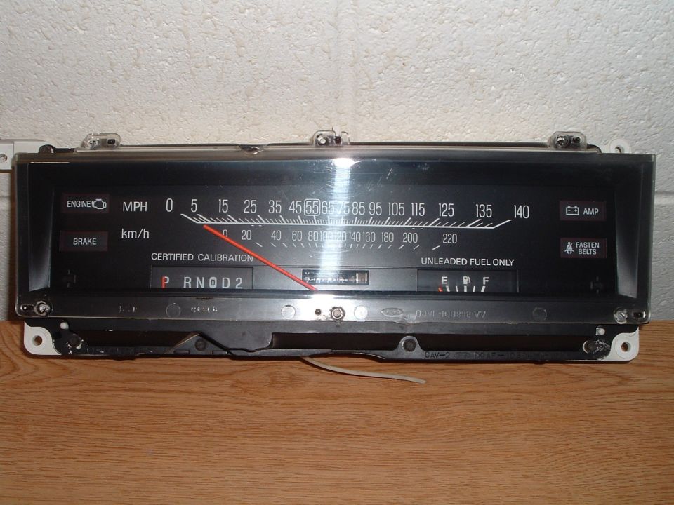 Removed Ford instrument cluster with 140 mph horizontal speedometer, PRNOD2 indicator and fuel gauge