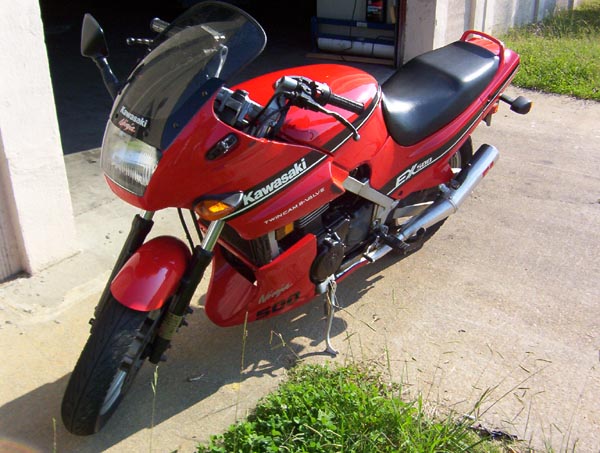 Red Kawasaki Ninja EX500 motorcycle, 3q-front view