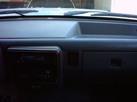 1990 Ford Bronco - Interior view of a 1990 Ford Bronco dashboard, showing the radio and air vent.