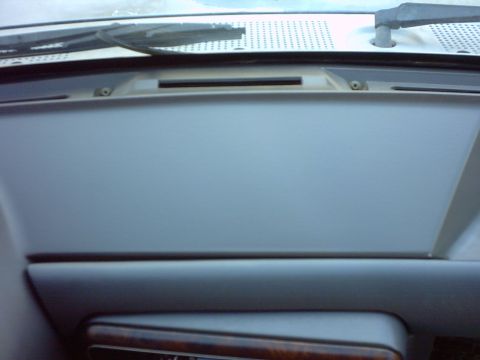 1990 Ford Bronco - Interior view of the dashboard in a 1990 Ford Bronco, showing the dash panel and air vents.