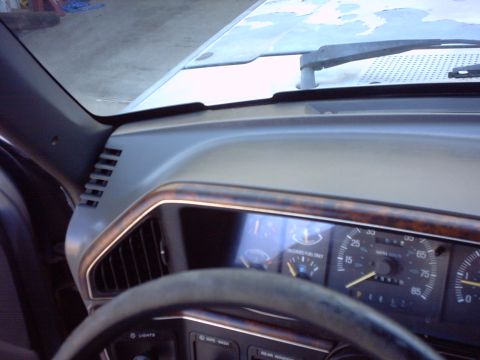 1990 Ford Bronco - The instrument cluster and dashboard trim are visible in this interior shot of an older vehicle.