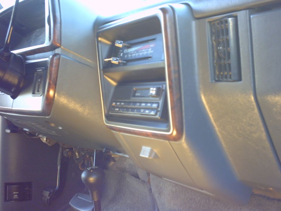 Interior dashboard with dual radios and floor shifter