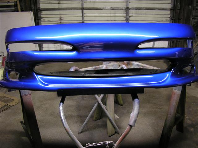 Blue bumper on sawhorses