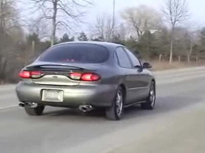 1999 Ford Taurus - Outside the car, launching from stop, driving by, and decelerating.