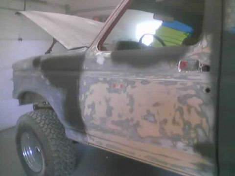 1989 Ford Bronco - Primer on bondo places.