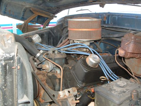 1979 Ford Bronco - Close-up view of an engine bay, showing various components and wiring.