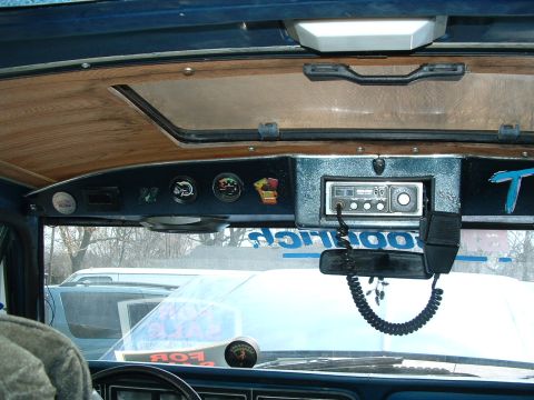 1979 Ford Bronco - Interior view of a vehicle's dashboard, showing a CB radio and various gauges.